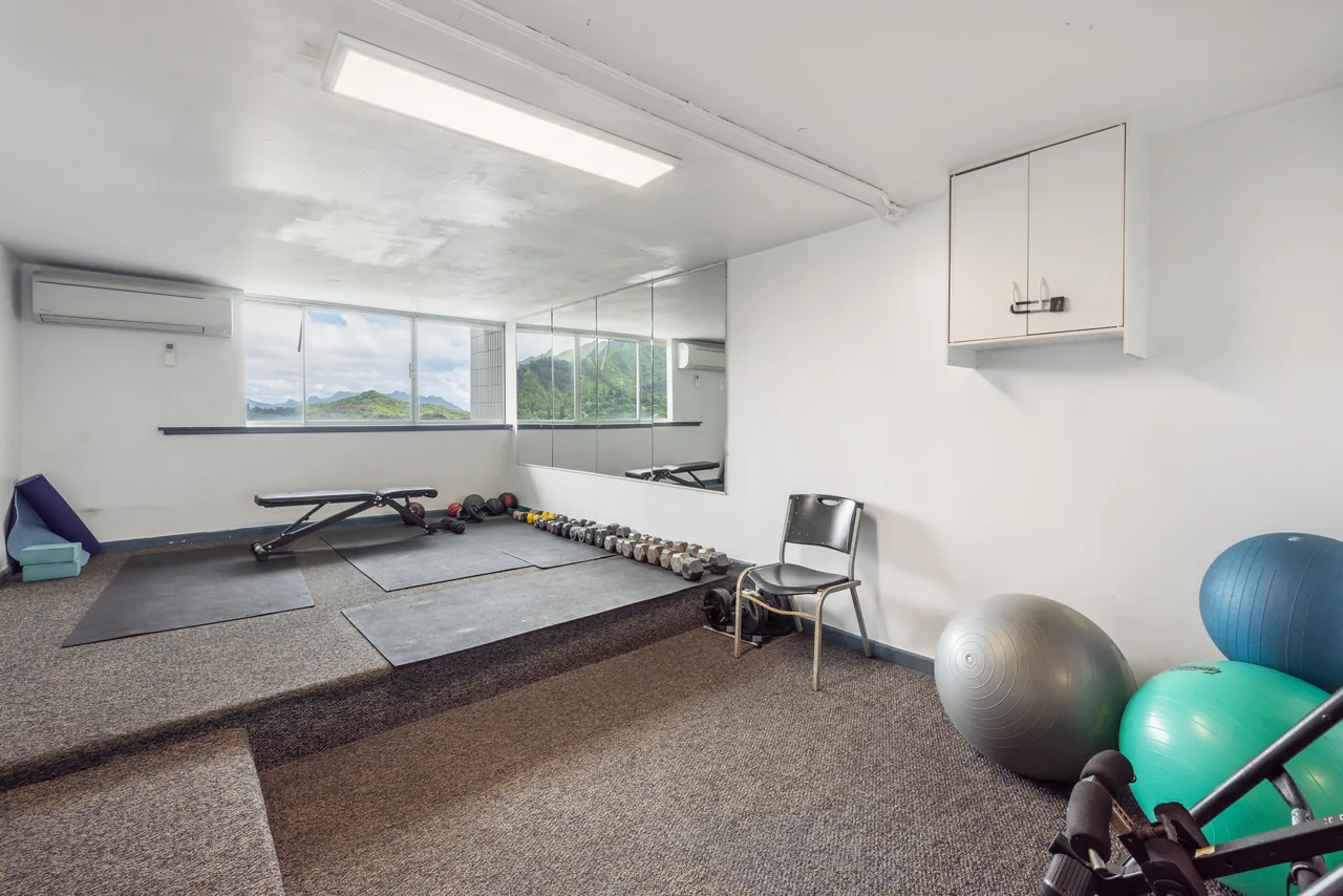On-site fitness room with cardio and strength equipment